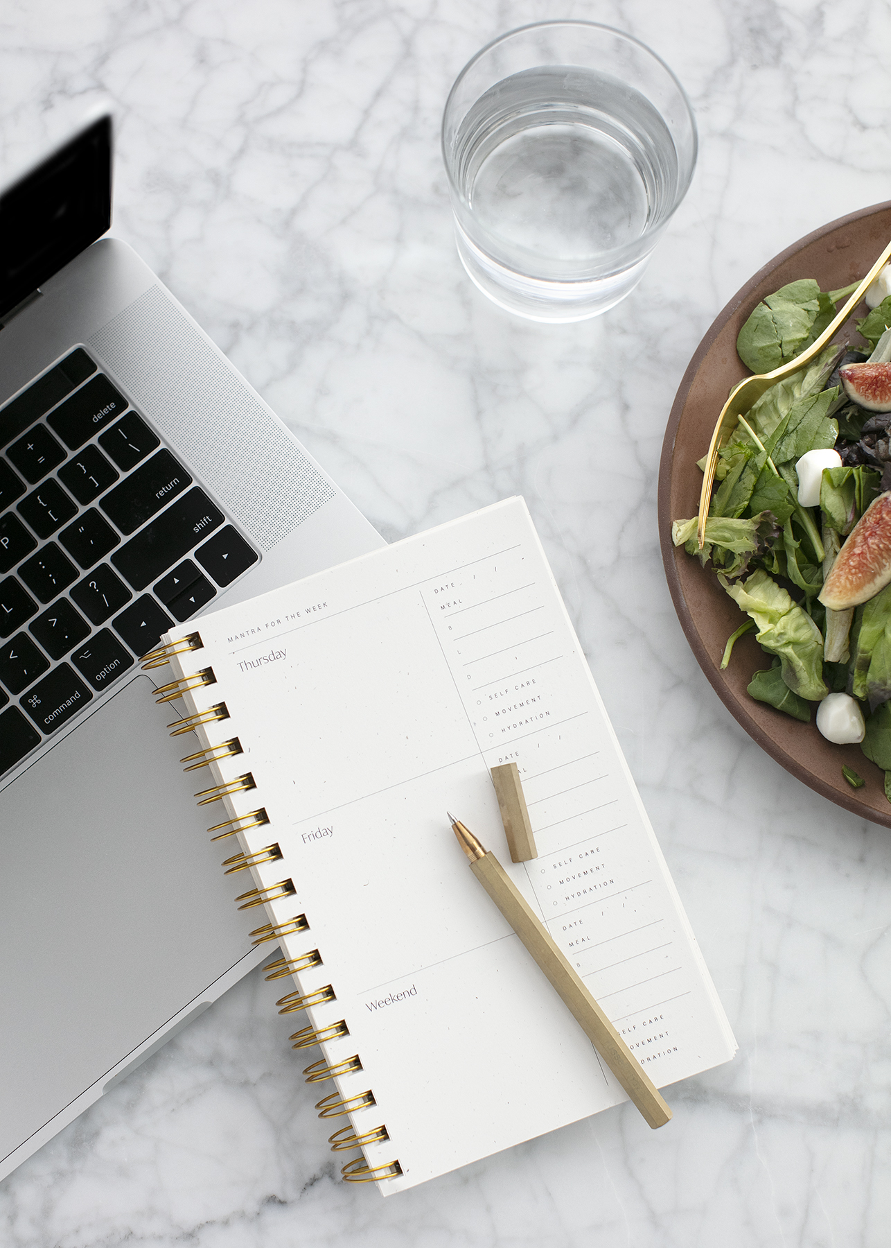 laptop planner salad water