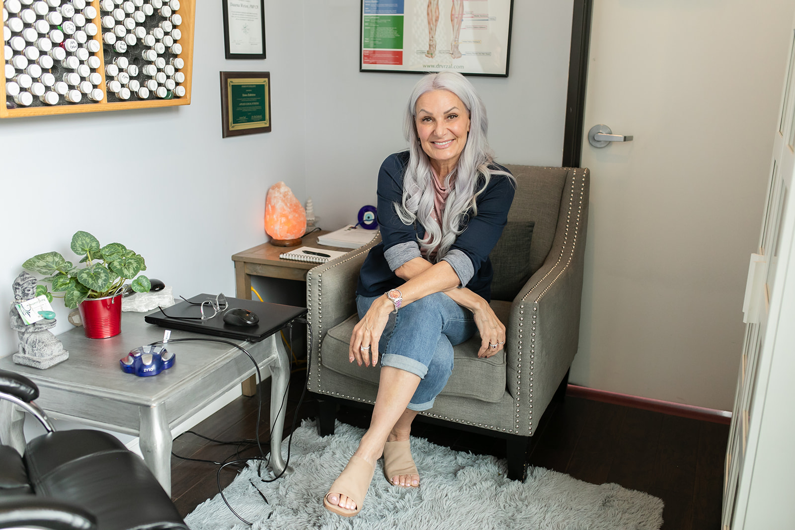 Dawna Weiss, clinical nutritionist and medical herbalist in Folsom, sitting in her office where she helps clients with holistic wellness